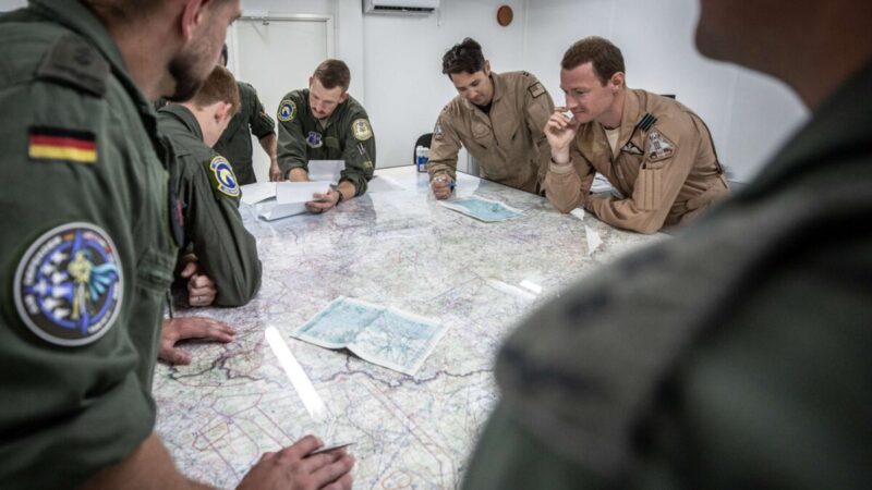 Military Planning scaled e1760407760528