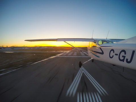 Cessna Landing at Sunset